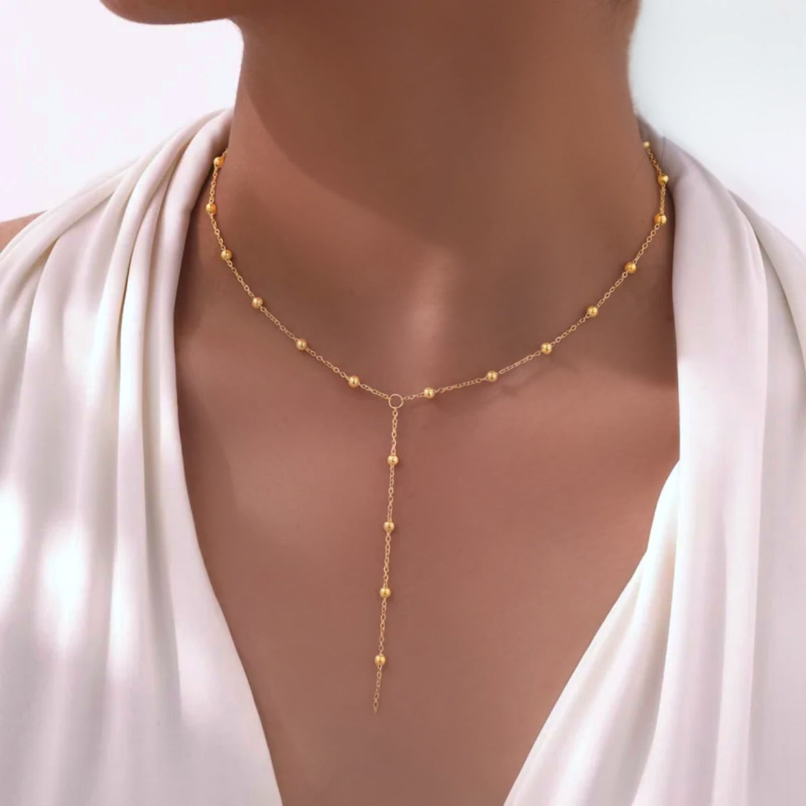 Long dotted bead gold necklace 