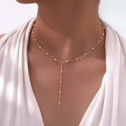 Long dotted bead gold necklace 