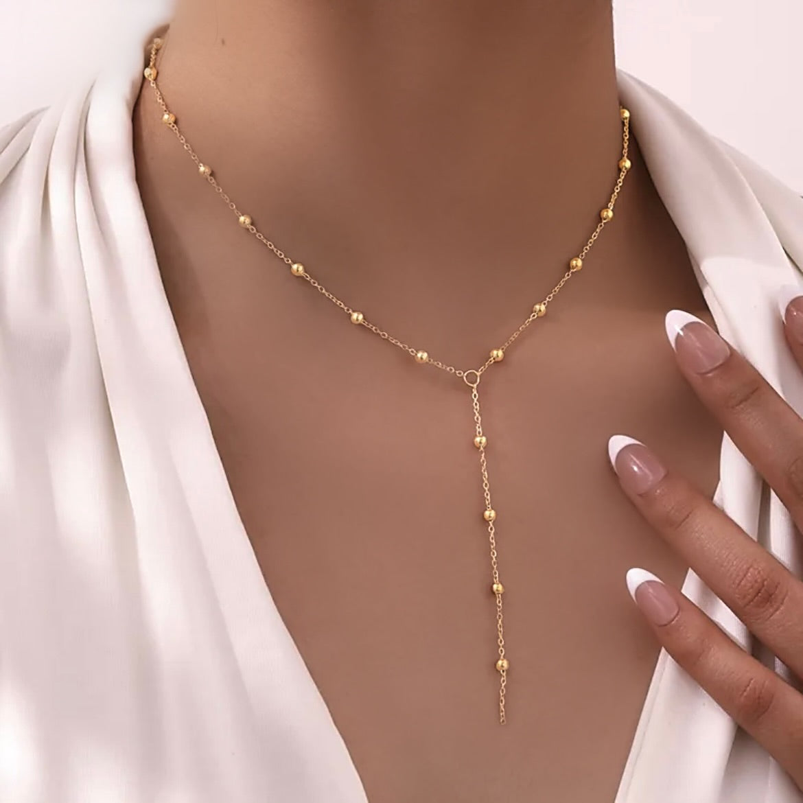 Gold bead y chain necklace 