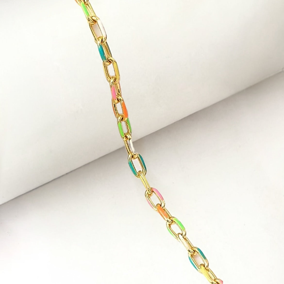 Neon chain necklace on a white background