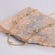 Gold dot necklace 