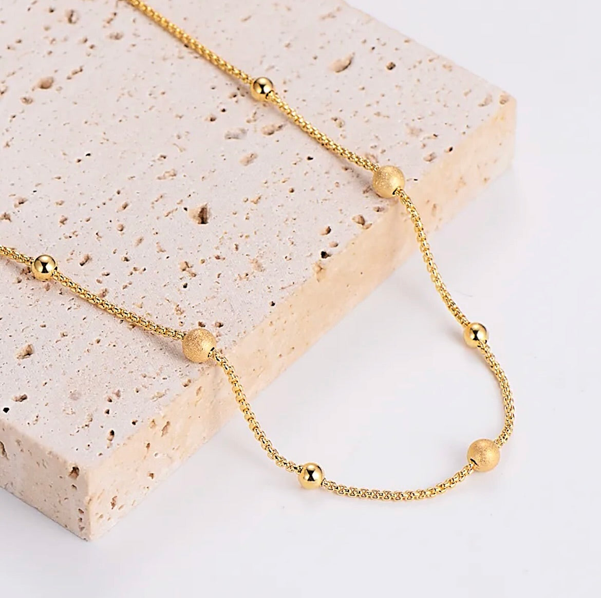 Gold dot necklace