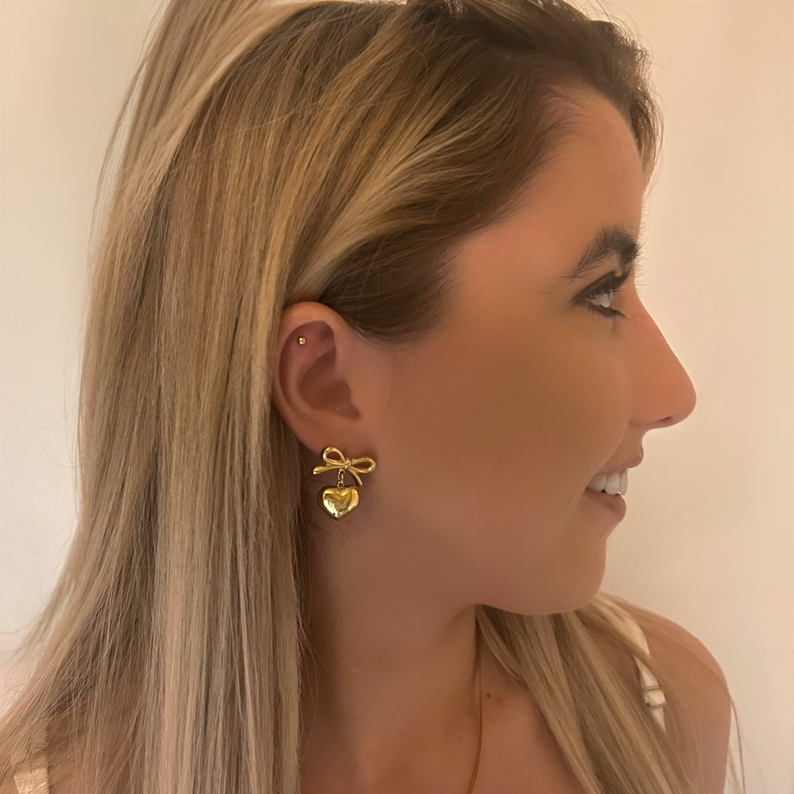 Bow heart earrings