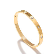 Diamanté dotted gold bangle 