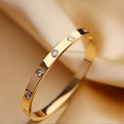 Diamanté dotted gold bangle 