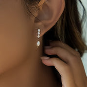 Diamond earrings with pearl drop 