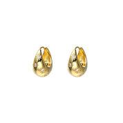 Chunky gold huggie earrings with diamond stars 