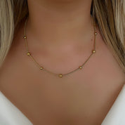 Gold dot necklace 