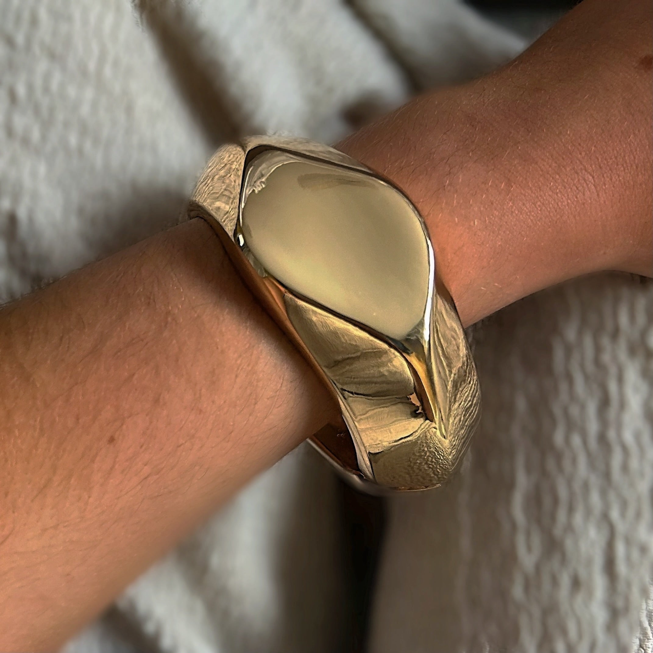 Chunky gold bangle
