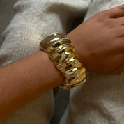 Chunky gold wave bangle