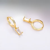 Gold huggie earrings with diamond pendant 