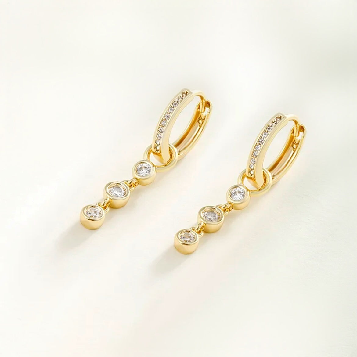 Diamond drop huggie earrings  