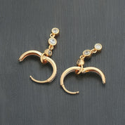 Diamond drop huggie earrings