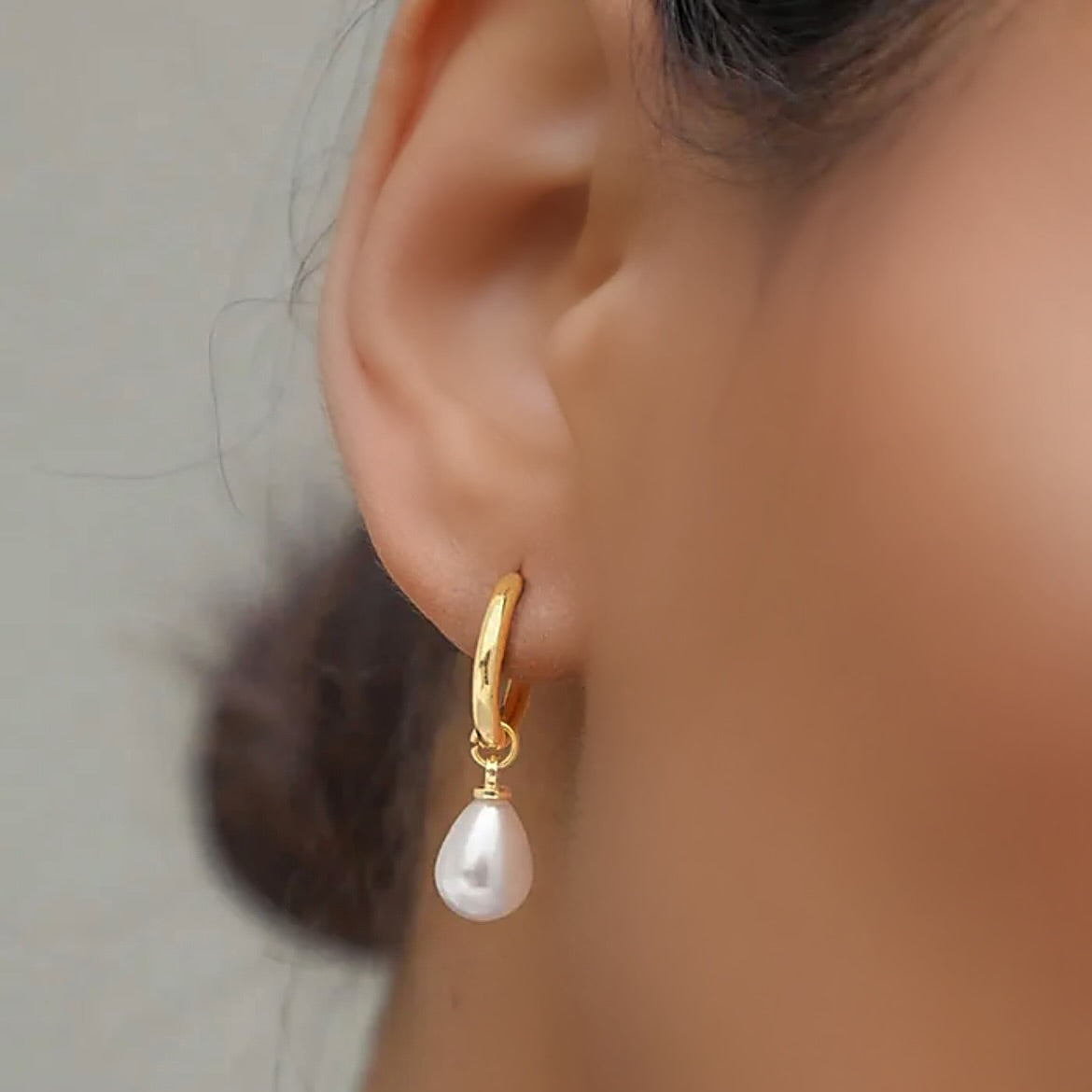 Gold Pearl huggie earrings 