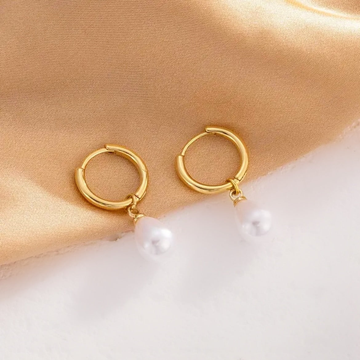 Gold Pearl huggie earrings 
