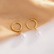 Gold Pearl huggie earrings 