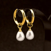 Gold Pearl huggie earrings 