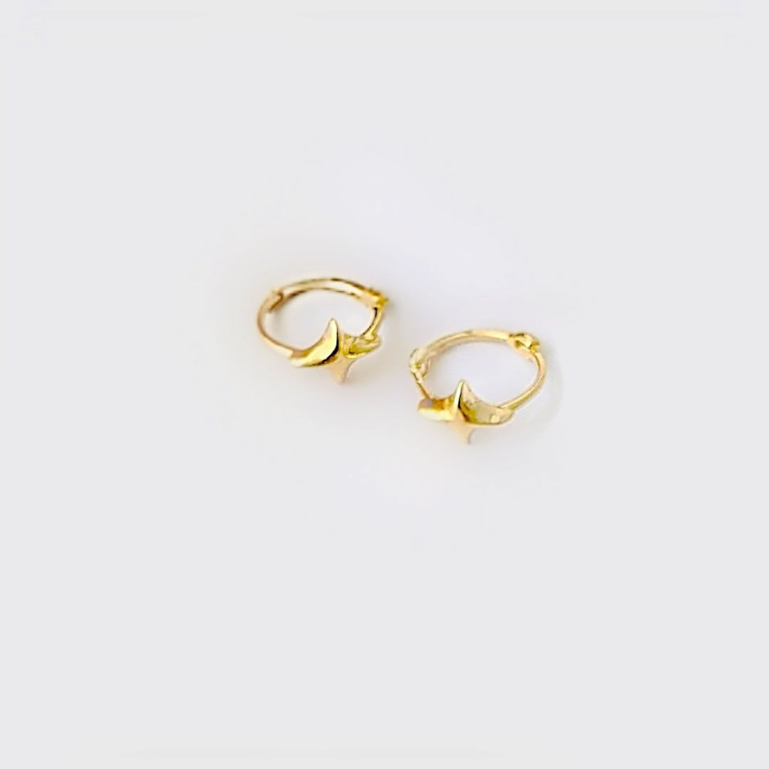 Gold star huggie earrings 