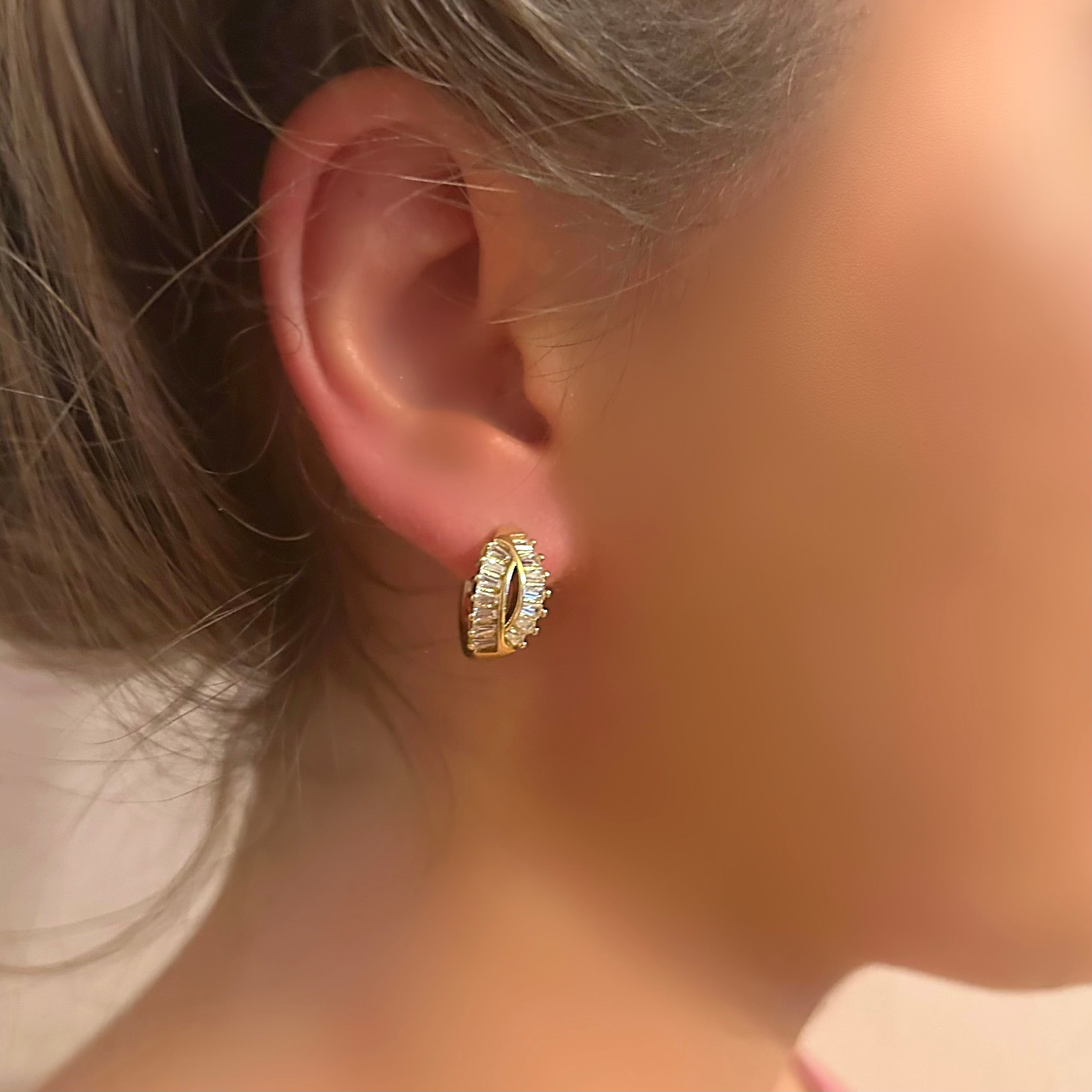 Diamond crossover gold huggie earrings