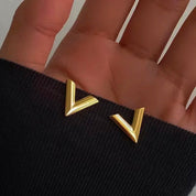 Gold v stud earrings 