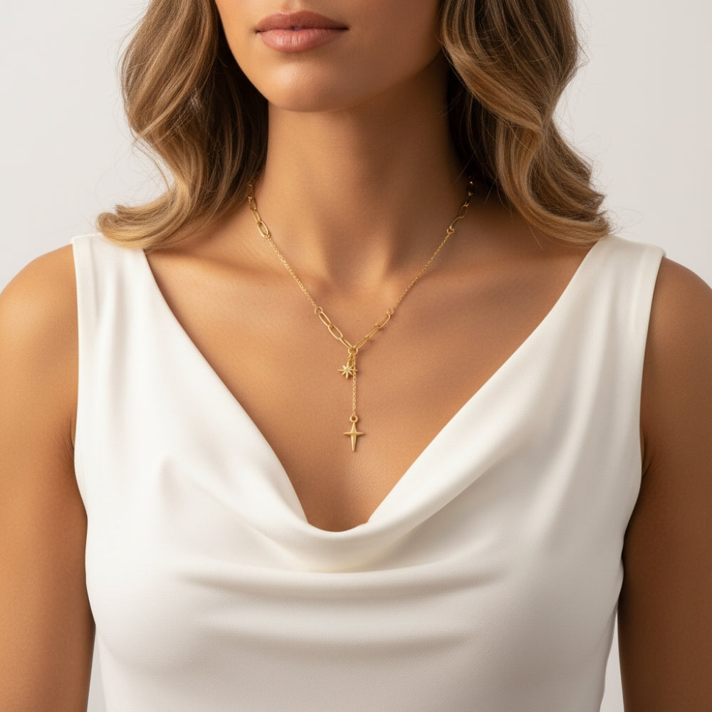 Y necklace with 2 gold stars on model in white vest