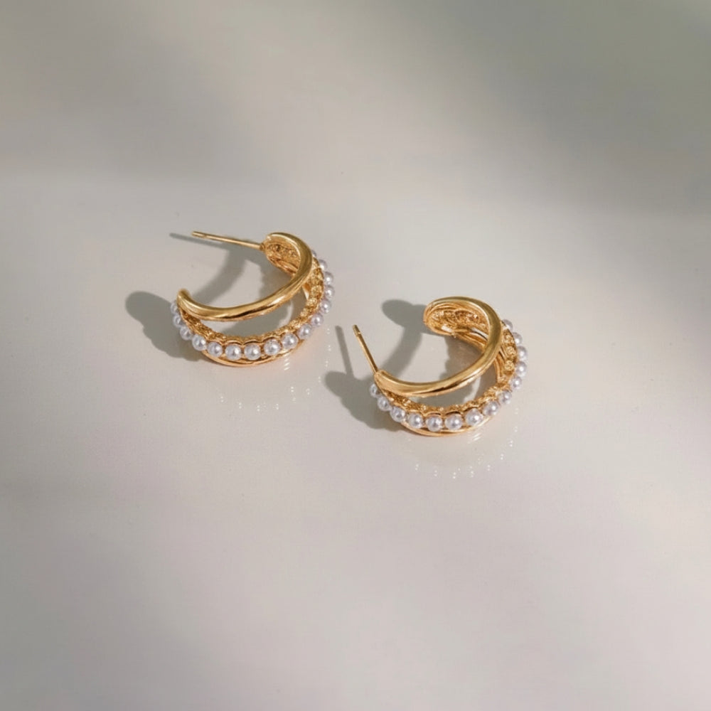 Gold hoop earrings with pearls 