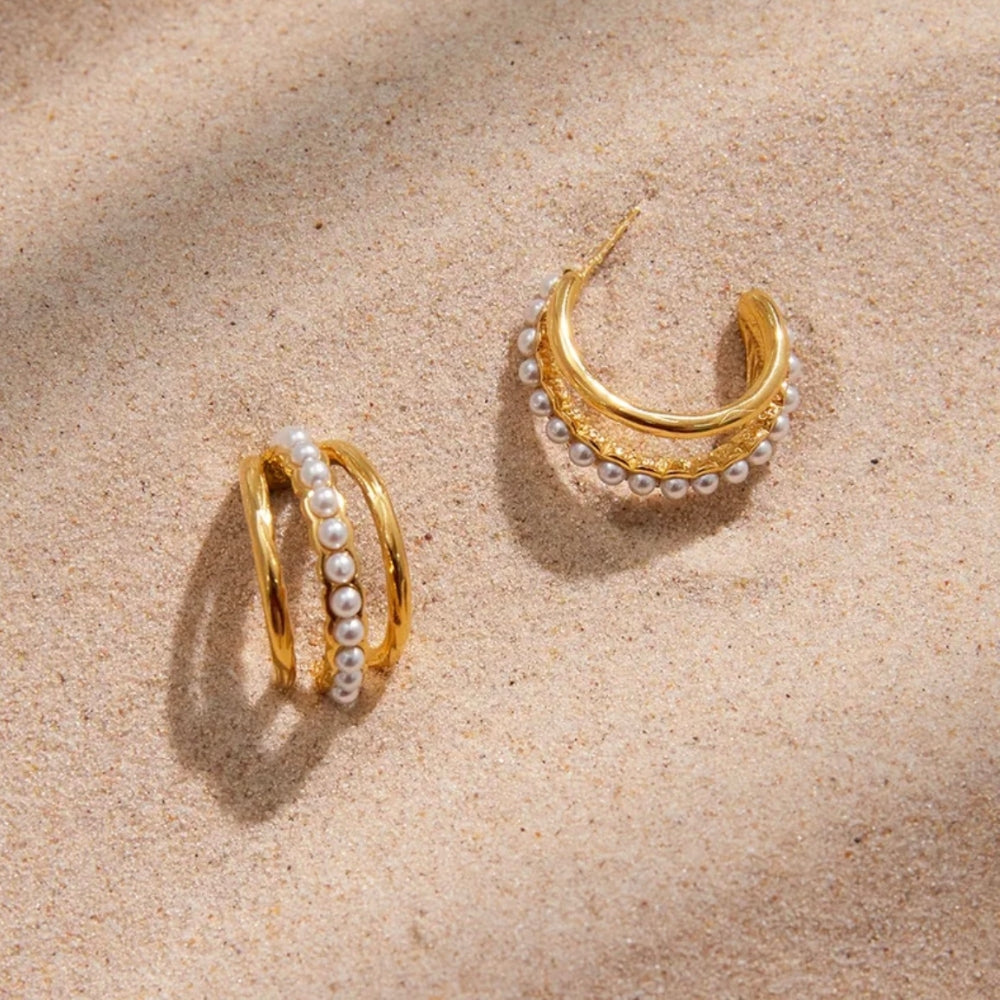 Gold hoop earrings with row of pearls 