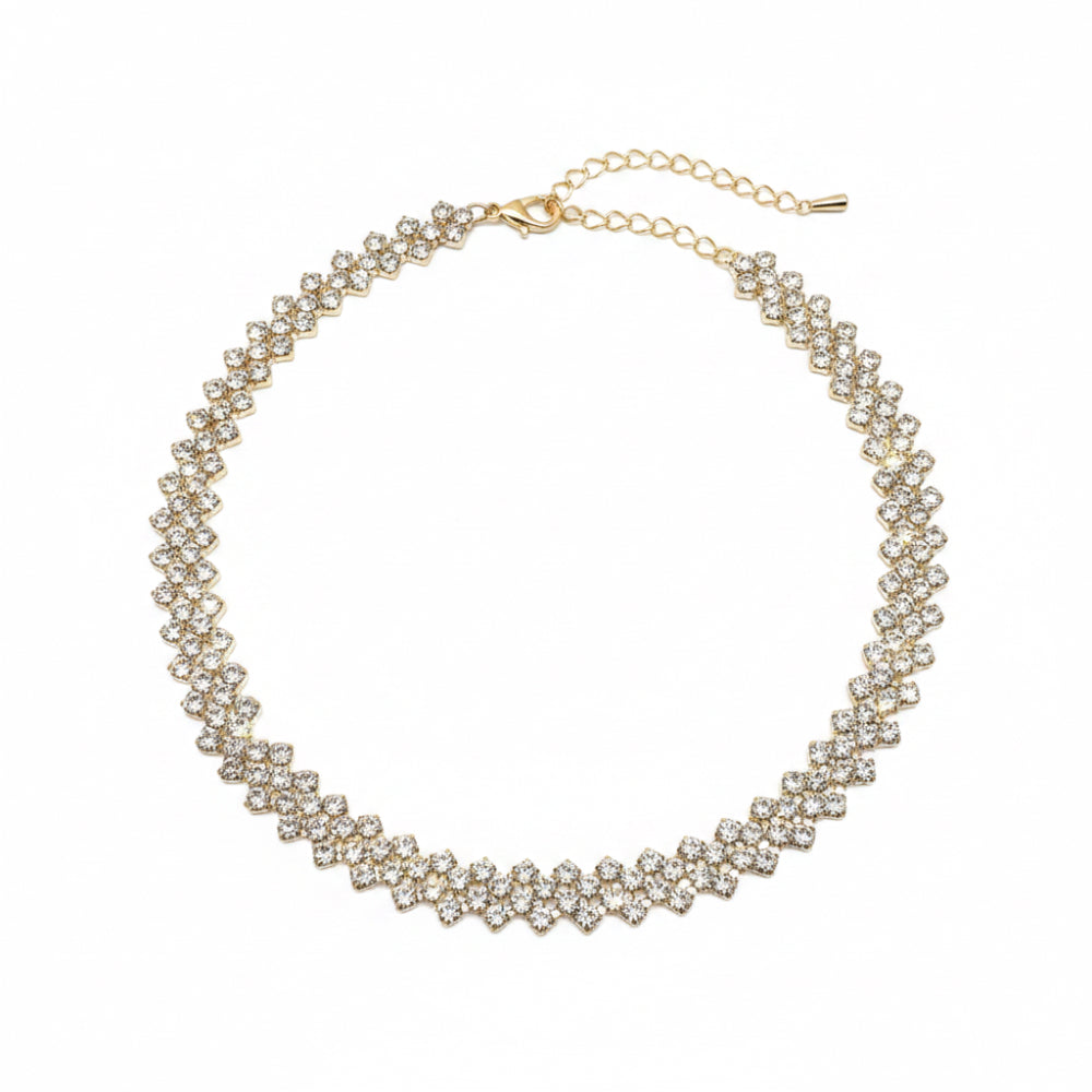 A gold-toned choker necklace adorned with multiple rows of clear rhinestones, featuring a matching gold chain extender and clasp, shown on a plain white background.