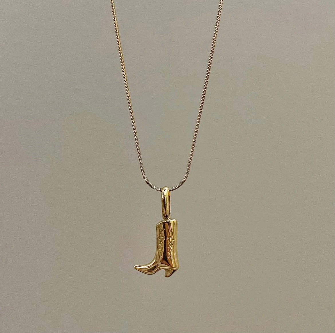 Gold cowboy boot necklace 