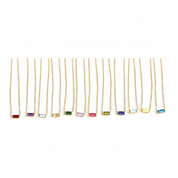 Twelve delicate gold chain necklaces with rectangular bezel-set gemstone pendants in various colors, arranged in a neat row against a solid white background.