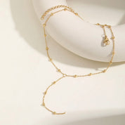 Gold bead y necklace 