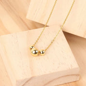 Gold Sphere Necklace