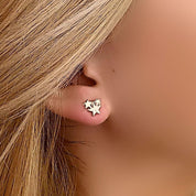 Rose gold star studs