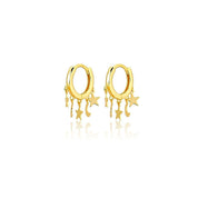 Pair of gold star and crescent moon charm huggie earrings 