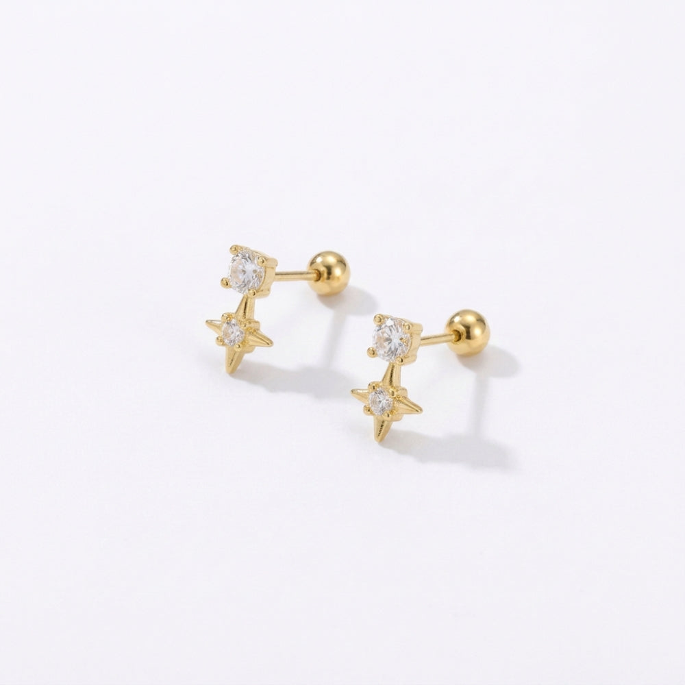 Angled view of Sparkling star earrings showing CZ crystal studs, gold stars and round ball backs 