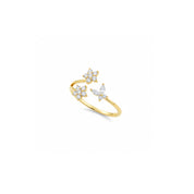 Gold ring with crystal clusters in flower and butterfly design 