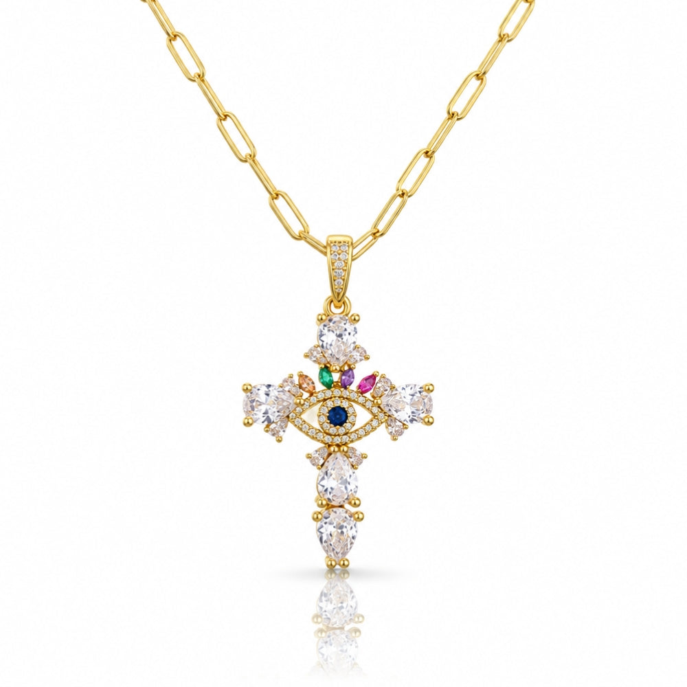 Gold-tone evil eye cross necklace with clear stones, colourful accents and a blue centre on a white background.