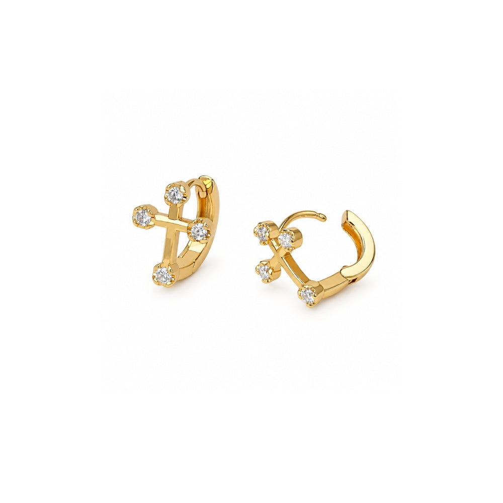 Pair of gold cz cross huggie earrings with clear stones at each cross tip