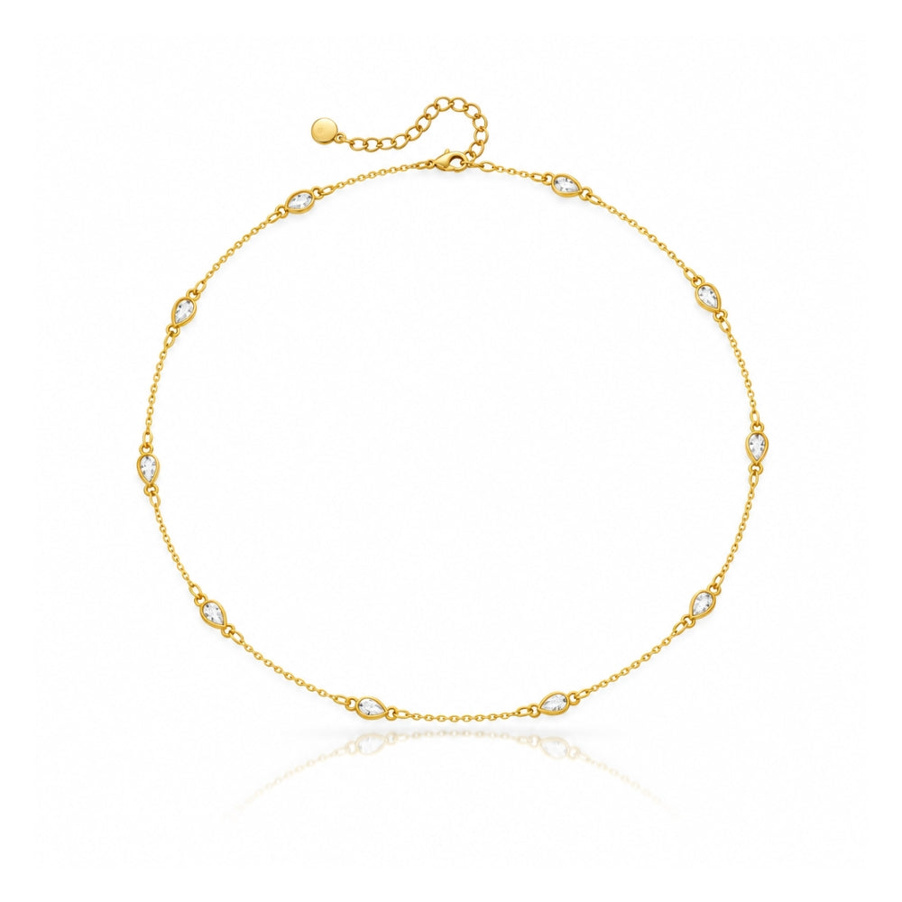 Gold necklace with spaced clear teardrop crystals 