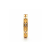 A slim gold bangle bracelet featuring three vertical rows of interlocking 'X' motifs paved with small clear stones, shown on a plain white background.
