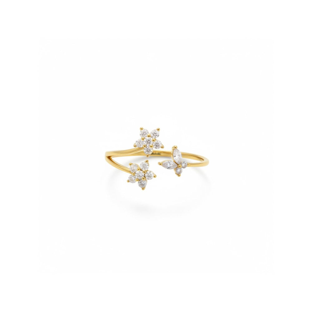 Gold ring with crystal flower design and butterfly 