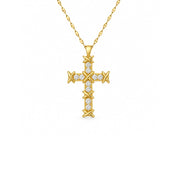 A gold cross pendant necklace with small clear stones, shown on a white background.