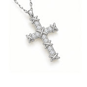 A silver cross pendant necklace paved with small clear stones, featuring barbed wire details at the ends, shown on a white background.